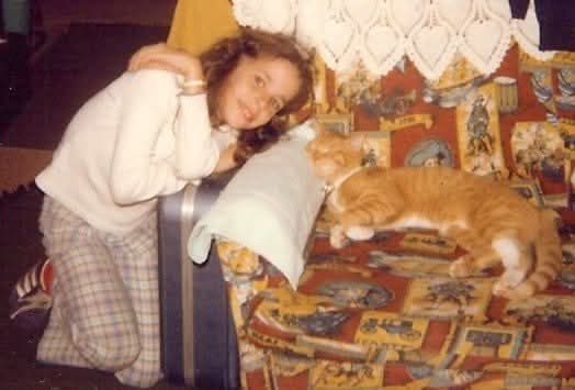 Teresa playing with dogs